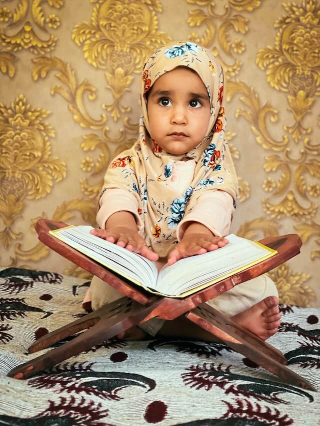 Girl Child Reading Holy Quran